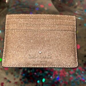 kate spade card holder/ mini wallet 1 middle money pocket and 6 card pockets